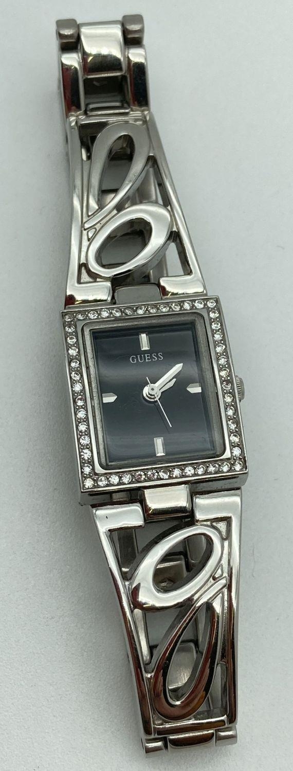 A ladies stainless steel bracelet wristwatch by Guess. Square case set with small crystals. Black - Bild 2 aus 2