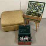 A vintage leather footstool together with a vintage wicker sewing box on 4 legs with floral interior