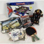 A collection of assorted vintage and modern toys to include Airfix kits and Talk-A-Tron robot. Lot