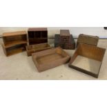 A collection of vintage wooden boxes and crates in varying sizes.