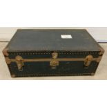 A vintage Watajoy metal banded leatherette travelling trunk with makers nameplate to front.