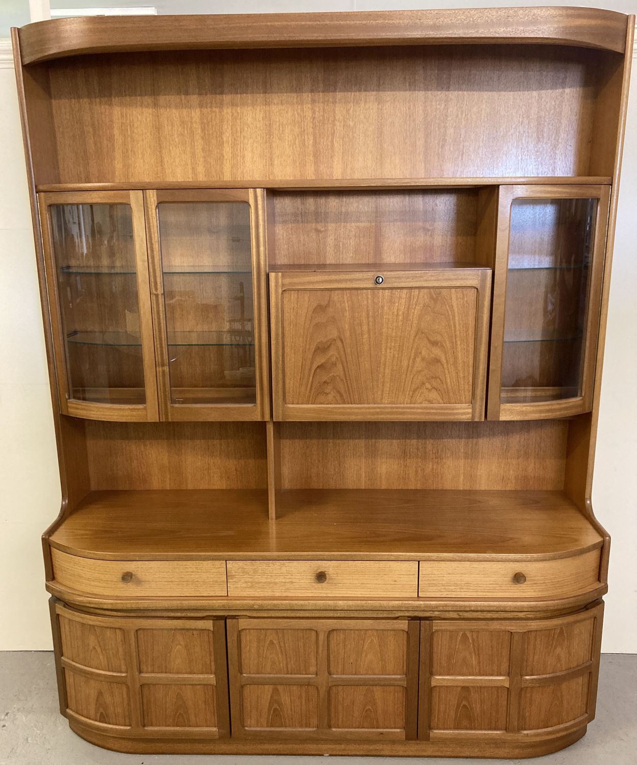 A very large vintage Nathan 2 sectional teak wall unit, #4154 Combination unit.