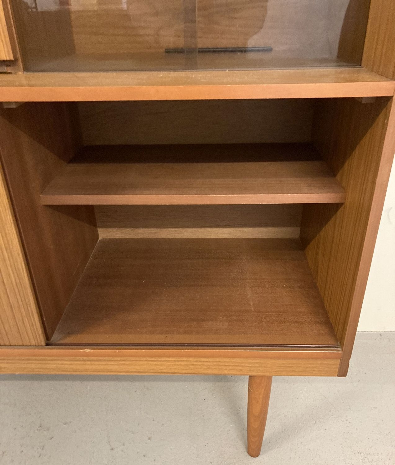 A vintage mid century Schreiber teak sideboard with sliding doors, drawers and glass shelves. - Image 4 of 6