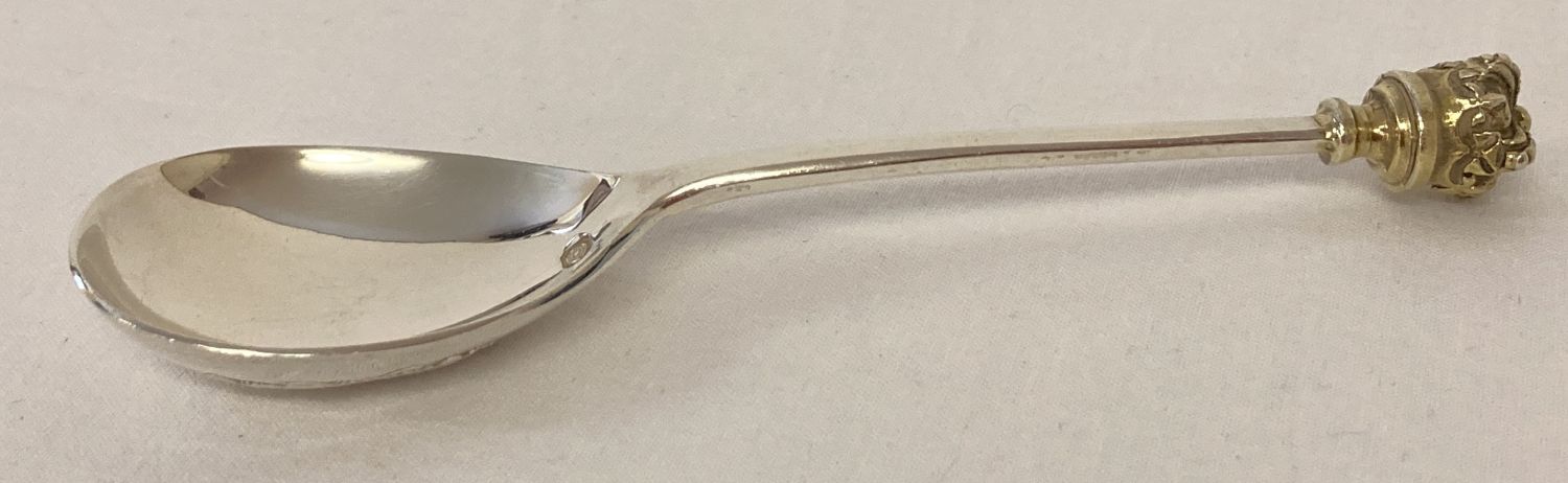 A silver Jubilee silver spoon with crown finial by Mappin & Webb.