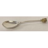 A silver Jubilee silver spoon with crown finial by Mappin & Webb.