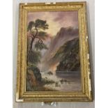 An early 20th century gilt framed oil on canvas of a sunset river scene.
