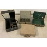 4 vintage carry cases and boxes.