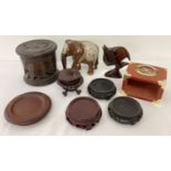 A collection of assorted wooden ethnic and oriental items.