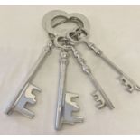 A modern ornamental large bunch of metal keys.