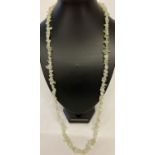 A 32" aventurine chip beaded costume jewellery necklace.