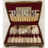 A vintage wooden cased 30 piece canteen of cutlery by James Ryals & Co. Ltd.