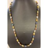 A 20" multicoloured freshwater pearl necklace with gold tone magnetic clasp.