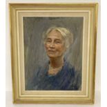 A framed oil on board portrait of a mature lady in a blue dress.