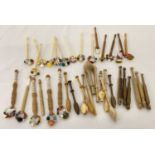 A quantity of assorted wooden & plastic handled beaded and unbeaded lacemaking bobbins.