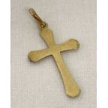 An 8ct gold cross shaped pendant complete with bale.