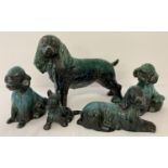 5 Blue Mountain ceramic dog figurines in varying sizes.
