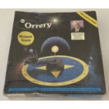 A vintage boxed & sealed 1980 "The Orrery" motorised version with audio cassette by Patrick Moore.