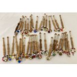 2 bags of chunky wooden handled lacemaking bobbins.