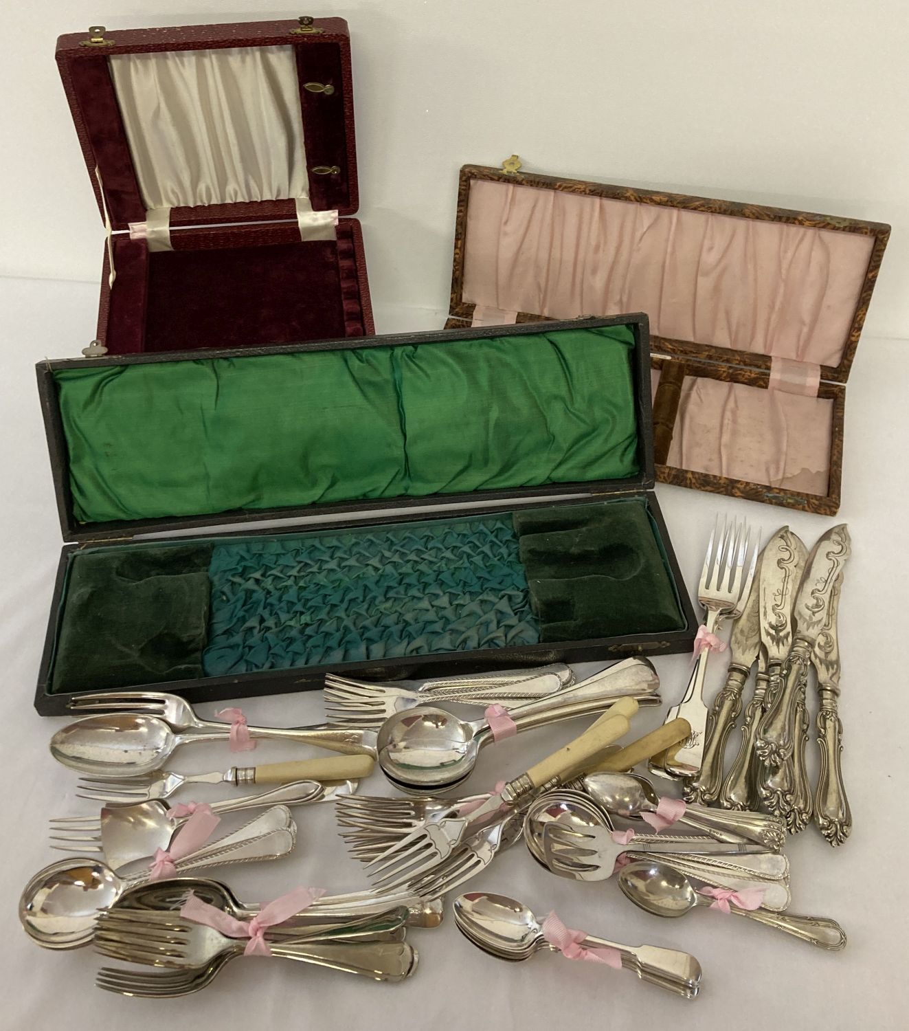 3 vintage empty cutlery cases together with a collection of vintage silver plated cutlery.