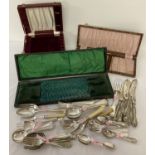 3 vintage empty cutlery cases together with a collection of vintage silver plated cutlery.