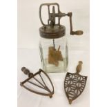 A vintage tabletop Blow Butter Churn 3/30, together with 2 wooden handled metal iron trivets.