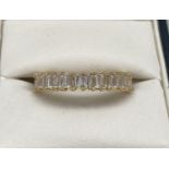 A 14ct gold plated Swarovski crystal set costume jewellery full eternity style ring. Set with 30