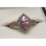 A 14ct gold plated costume jewellery cocktail ring set with Swarovski crystals. Pale pink marquis