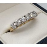 An 18ct gold 1.45ct diamond half eternity style ring. Set with 7 round cut diamonds. Full