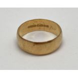 A 22ct gold 6mm wedding band. Full hallmarks to inside of band. Ring size P. Weighs approx. 5.2g.