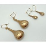 2 pairs of 9ct scrap gold teardrop shaped earrings. Small dents to both pairs. Total weight