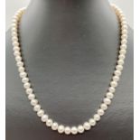A 17" freshwater pearl and crystal bead necklace with magnetic barrel clasp. Retired jewellery