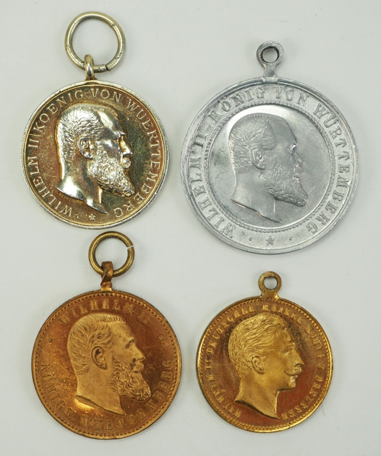 Württemberg: Lot von 4 Medaillen.