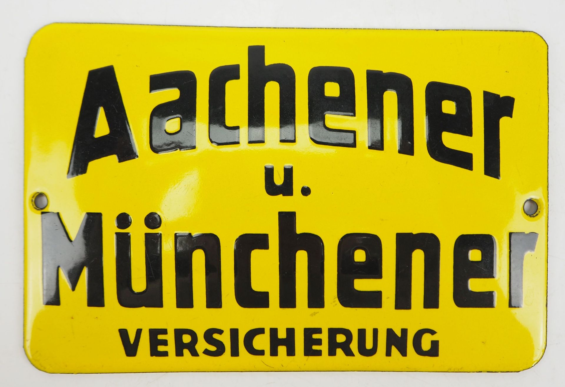 Emailieschild Aachener und Münchener Versicherung.