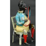 GUNTHERMANN MINSTREL WITH BANJO IN CHAIR TOY