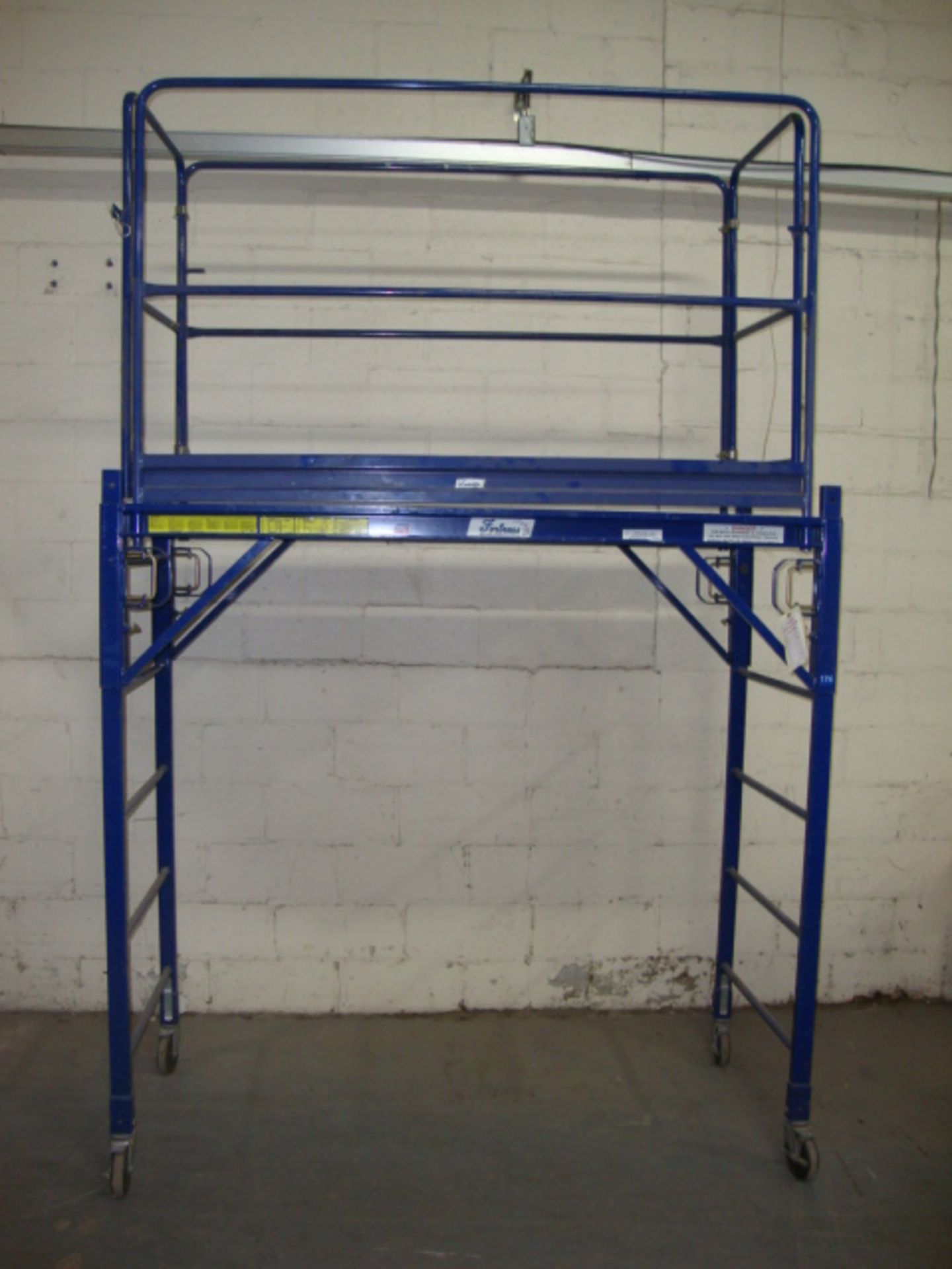 Louisville Rolling Tower Scaffold, Model Fortress # SS0606, 655lb Capacity, upper enclosure is