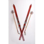 Pair of Austrian Fisher skis, with matching bamboo poles, Fisher logo which dates them to pre