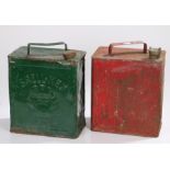 Shell-Mex BP metal petrol can in green, together with another petrol can in red, both with caps,