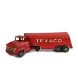Buddy L Texaco toy truck, in red with black wheels, Texaco to the trailer and logo to the cap,