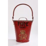 George VI fire bucket and cover, the body in red with lettering "FIRE SAND" above royal cypher, 44cm