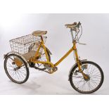 Pashley Picador tricycle, in yellow with a basket to the rear