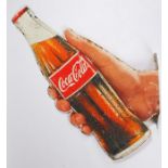 Coca Cola advertising sign, produced for the Middle East market, a hand clutching a bottle, 75cm