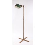 Industrial lamp, the green enamel shade above the adjustable pole