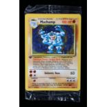 1999 Pokémon Machamp 8/102, Holographic card, still in the original plastic unopened sleeve