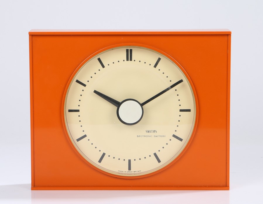 Smiths Sectronic 1960's mantel clock, the white dial with baton markers, housed in an orange plastic