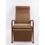 Greaves & Thomas 1970's recliner armchair, with stylised leaf decorated upholstery to the button