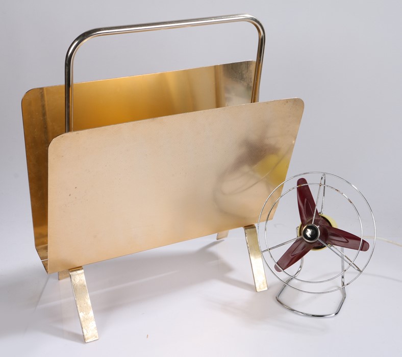 Aluminium magazine rack, together with a table top fan, (2)