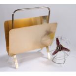 Aluminium magazine rack, together with a table top fan, (2)