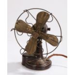 EMI bakelite and brass electric table fan, 1930's, the a wavy line fan cover above the bakelite