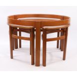 Mid 20th Century teak coffee table, the circular table lacking the glazed top, three smaller