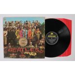 The Beatles - Sgt. Peppers Lonely Hearts Club Band LP ( PMC 7027 ), first pressing with red and